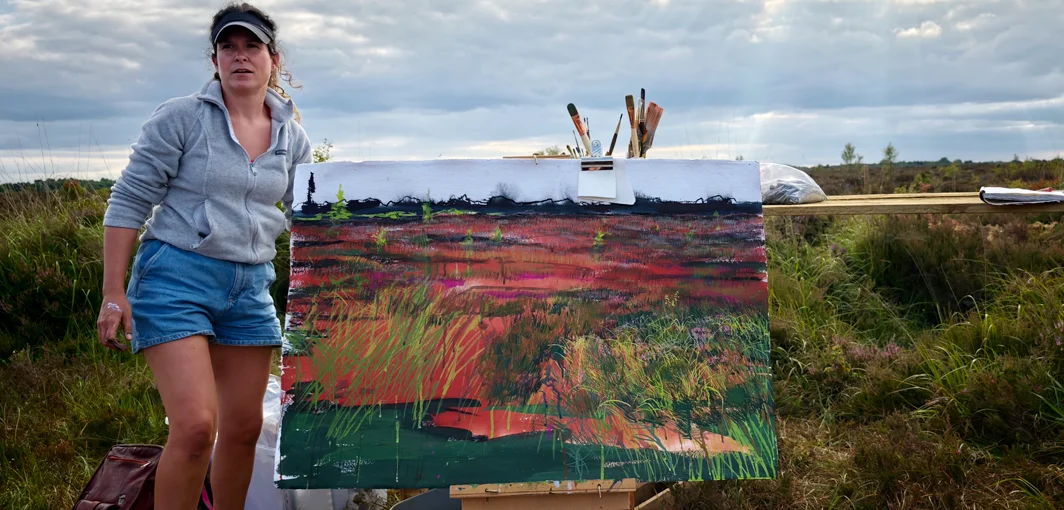 Artist Emer painting on Cornafulla Bog